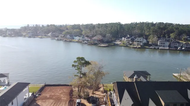 a view of a lake from balcony with outdoor space