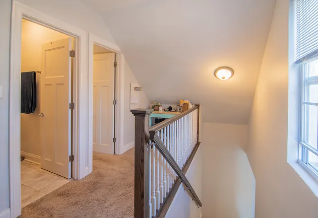 a view of a hallway with closet area