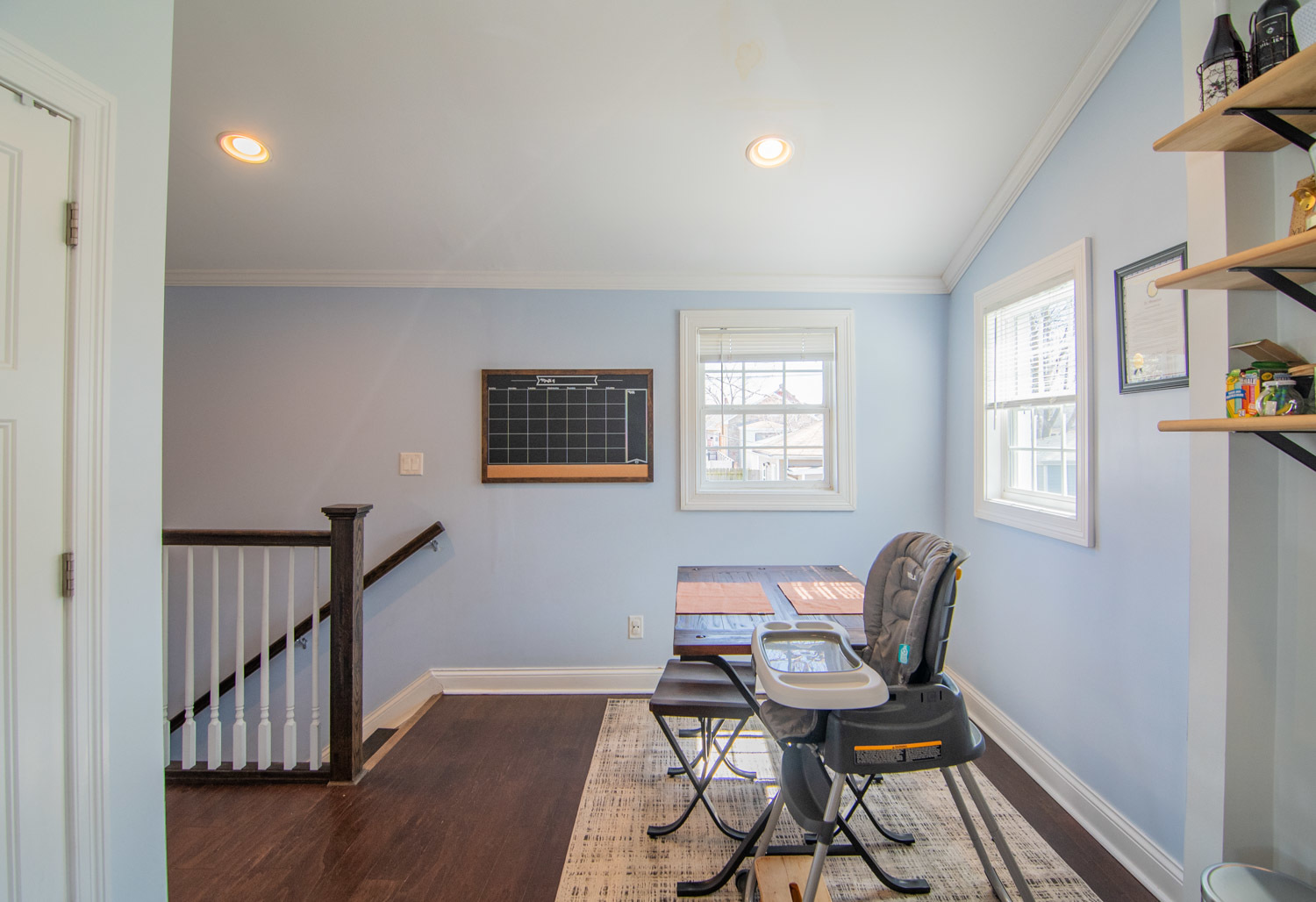 1513 Clinton Avenue Berwyn, IL 60402 - Photo 8 of 15 a view of a workspace with furniture and a window