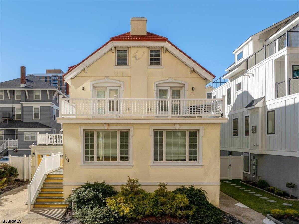 104 South Oakland Avenue, Unit JUNE '26 Ventnor City, NJ 08406 - Photo 41 of 57 a front view of a house with a yard