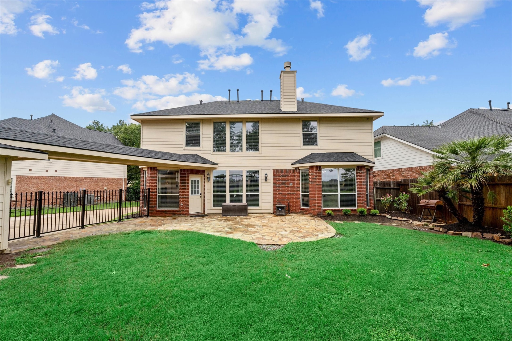 6323 Stone Trail Lane Spring, TX 77379 - Photo 28 of 43 a front view of a house with garden