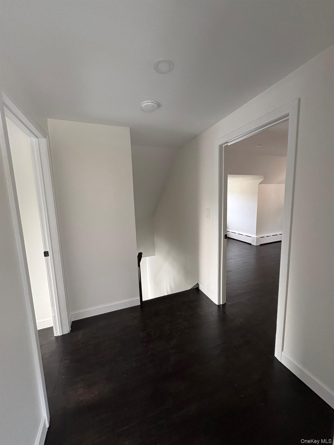 5852 State Rte 55 Liberty, NY 12754 - Photo 24 of 44 an empty room with wooden floor