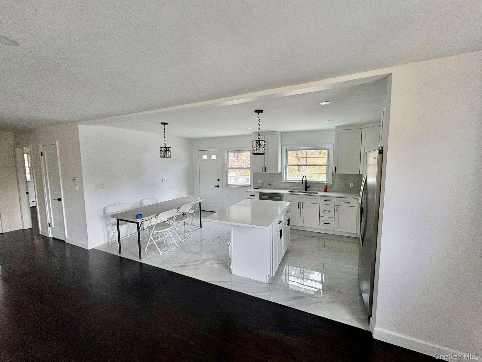 5852 State Rte 55 Liberty, NY 12754 - Photo 4 of 44 a living room with furniture and a large window