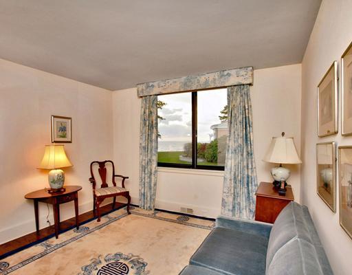 253 Long Neck Point Road Darien, CT 06820 - Photo 15 of 15 a living room with furniture and a window