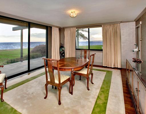 253 Long Neck Point Road Darien, CT 06820 - Photo 8 of 15 a view of a dining room with furniture window and outside view
