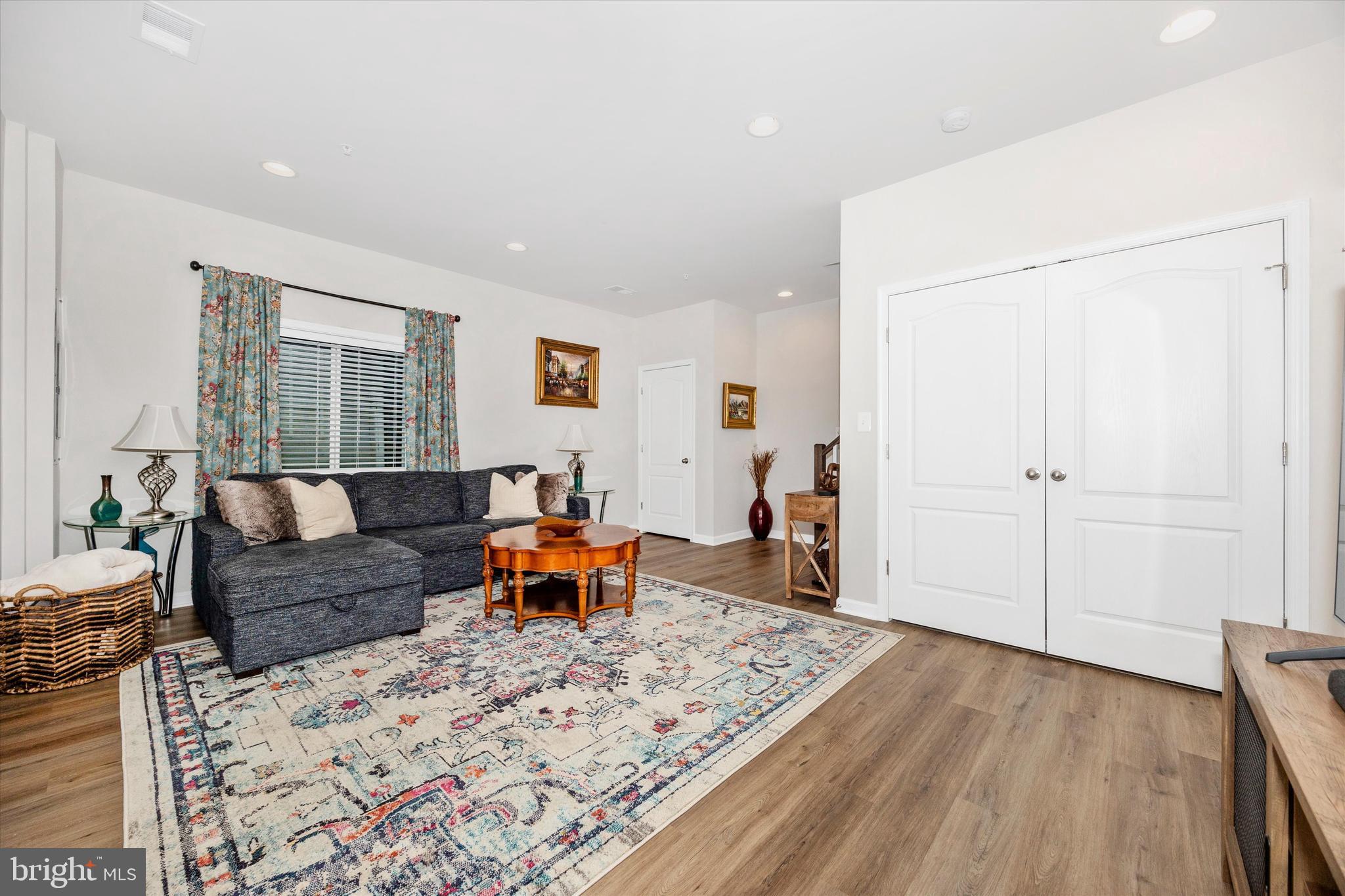 1817 Bird Run Frederick, MD 21702 - Photo 21 of 31 a living room with furniture and a wooden floor
