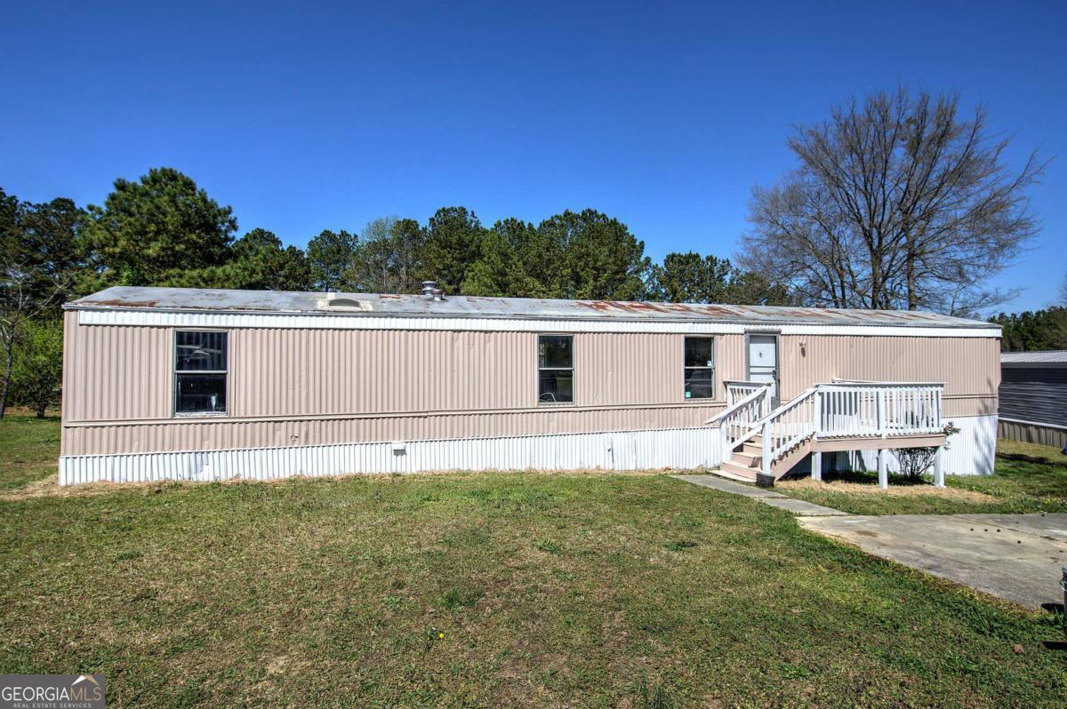 14 High Bluff Road Northeast Rome, GA 30165 - Photo 3 of 29 a view of a house with a yard