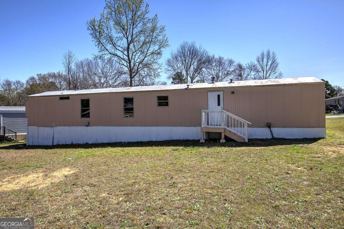 14 High Bluff Road Northeast Rome, GA 30165 - Photo 8 of 29 a view of a back yard