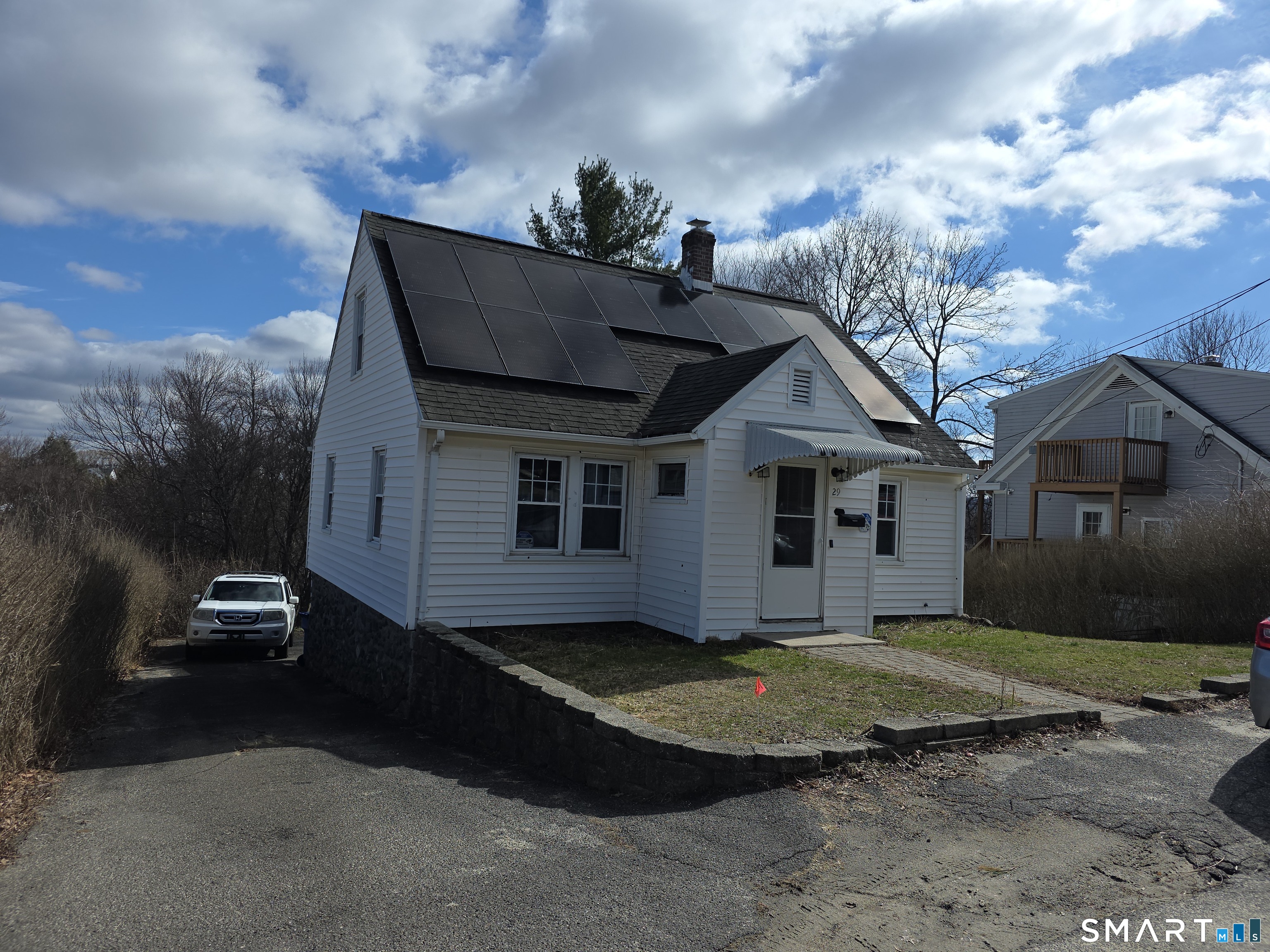 a view of a house with a patio