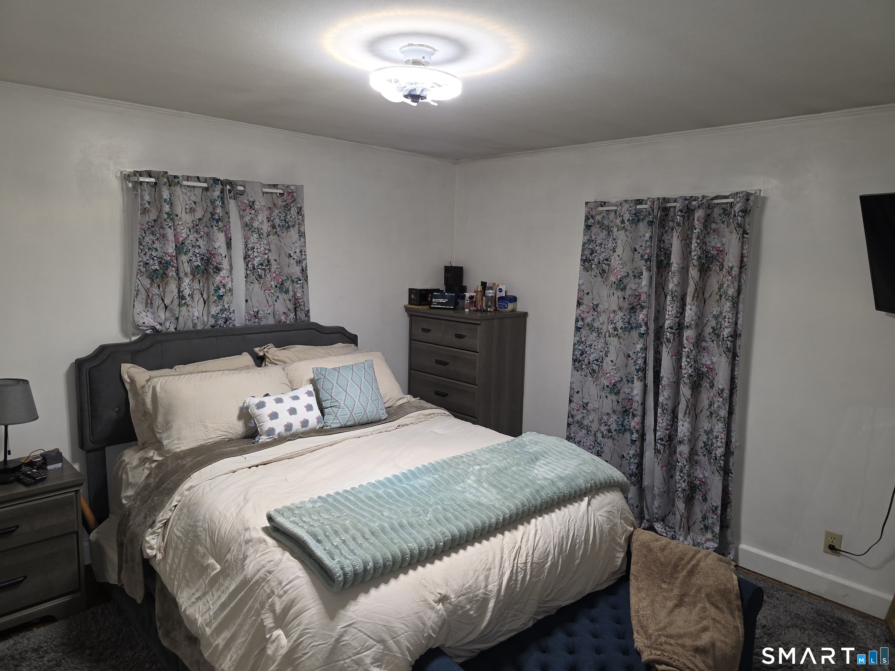 29 Esther Avenue Waterbury, CT 06708 - Photo 12 of 25 a bedroom with a bed and a walk in closet