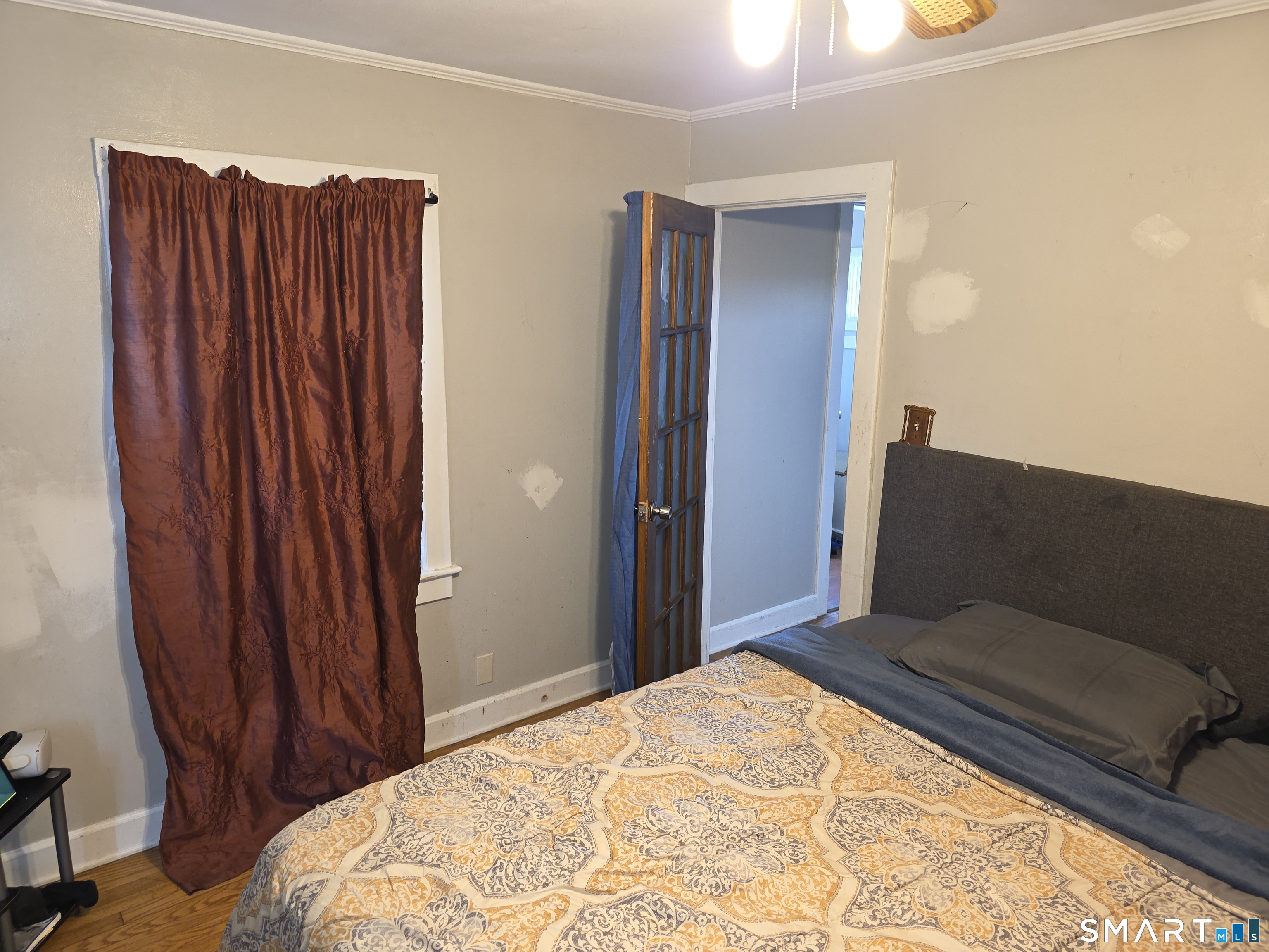 29 Esther Avenue Waterbury, CT 06708 - Photo 14 of 25 a bedroom with a bed and a dresser