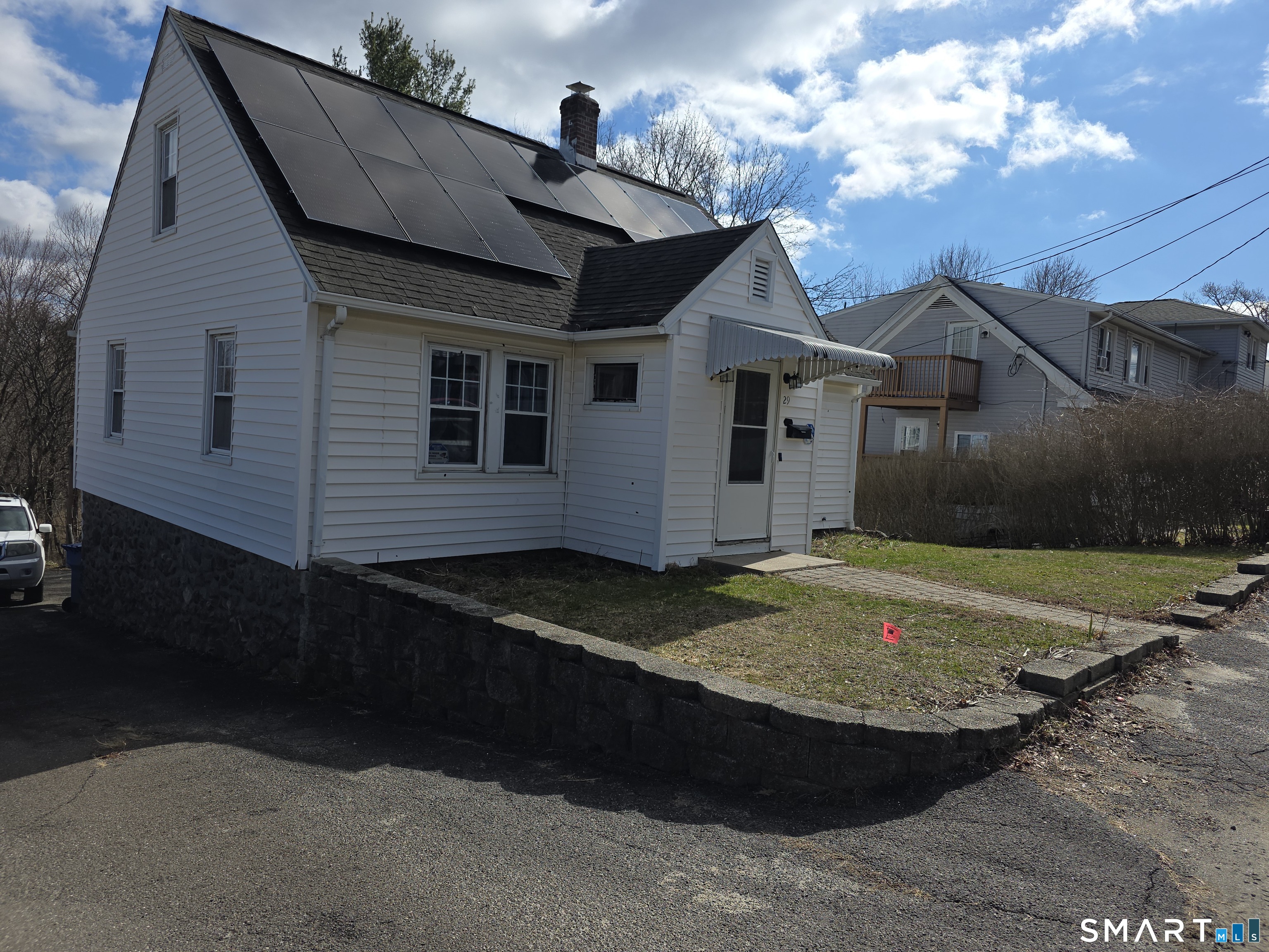 29 Esther Avenue Waterbury, CT 06708 - Photo 19 of 25 a view of a house with a backyard