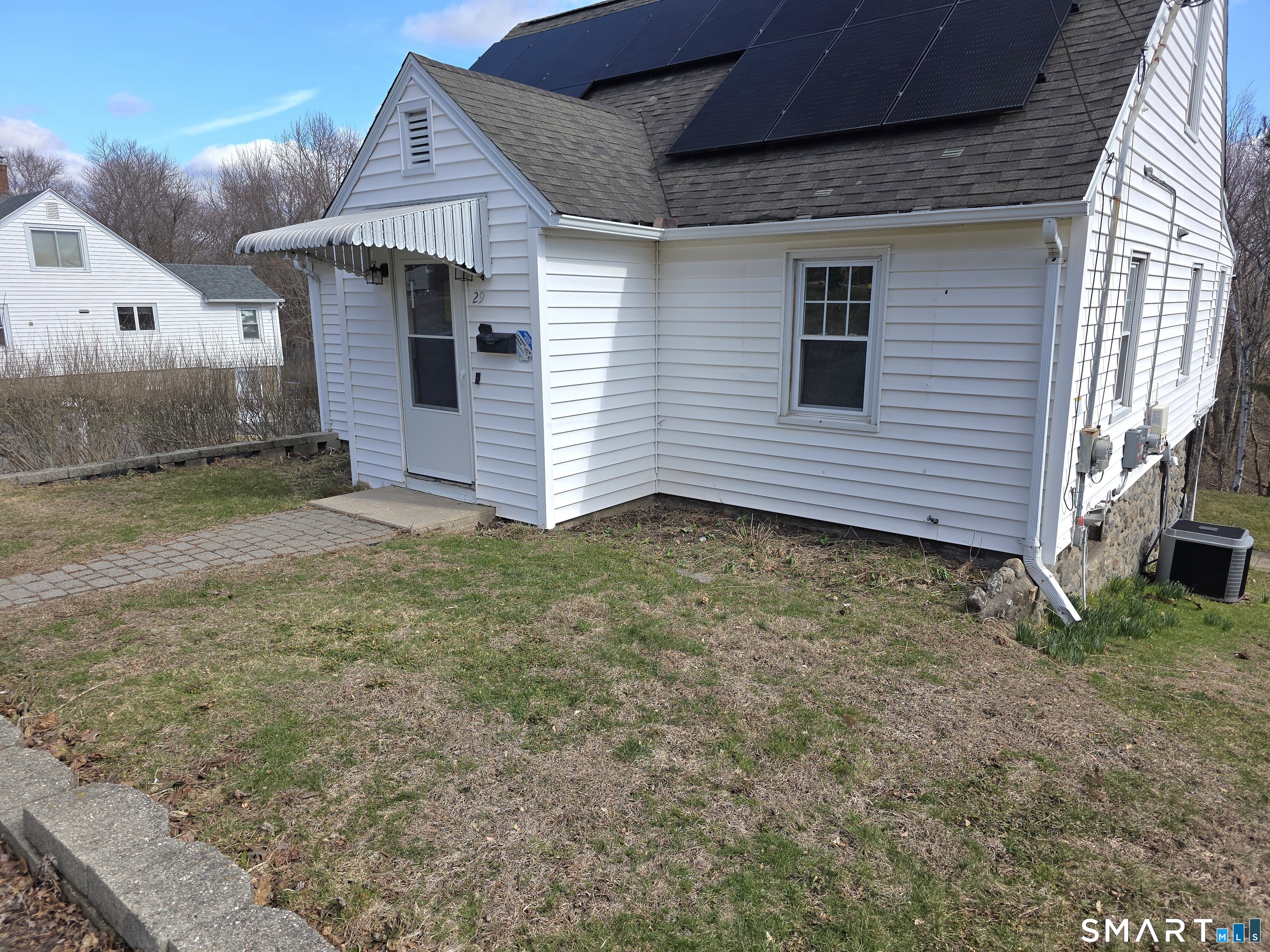 29 Esther Avenue Waterbury, CT 06708 - Photo 3 of 25 a view of a house with a yard