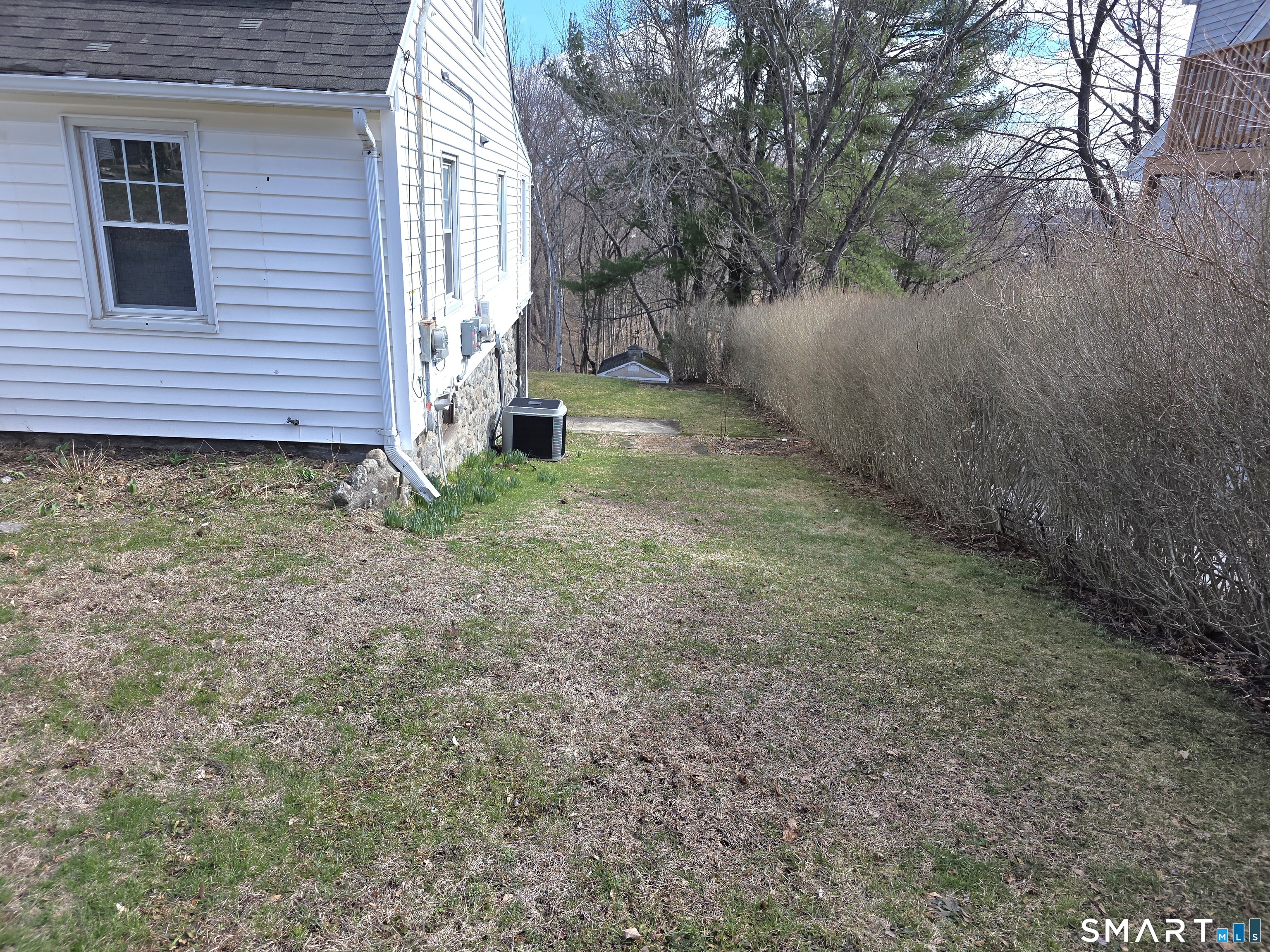29 Esther Avenue Waterbury, CT 06708 - Photo 4 of 25 a view of a house with a yard