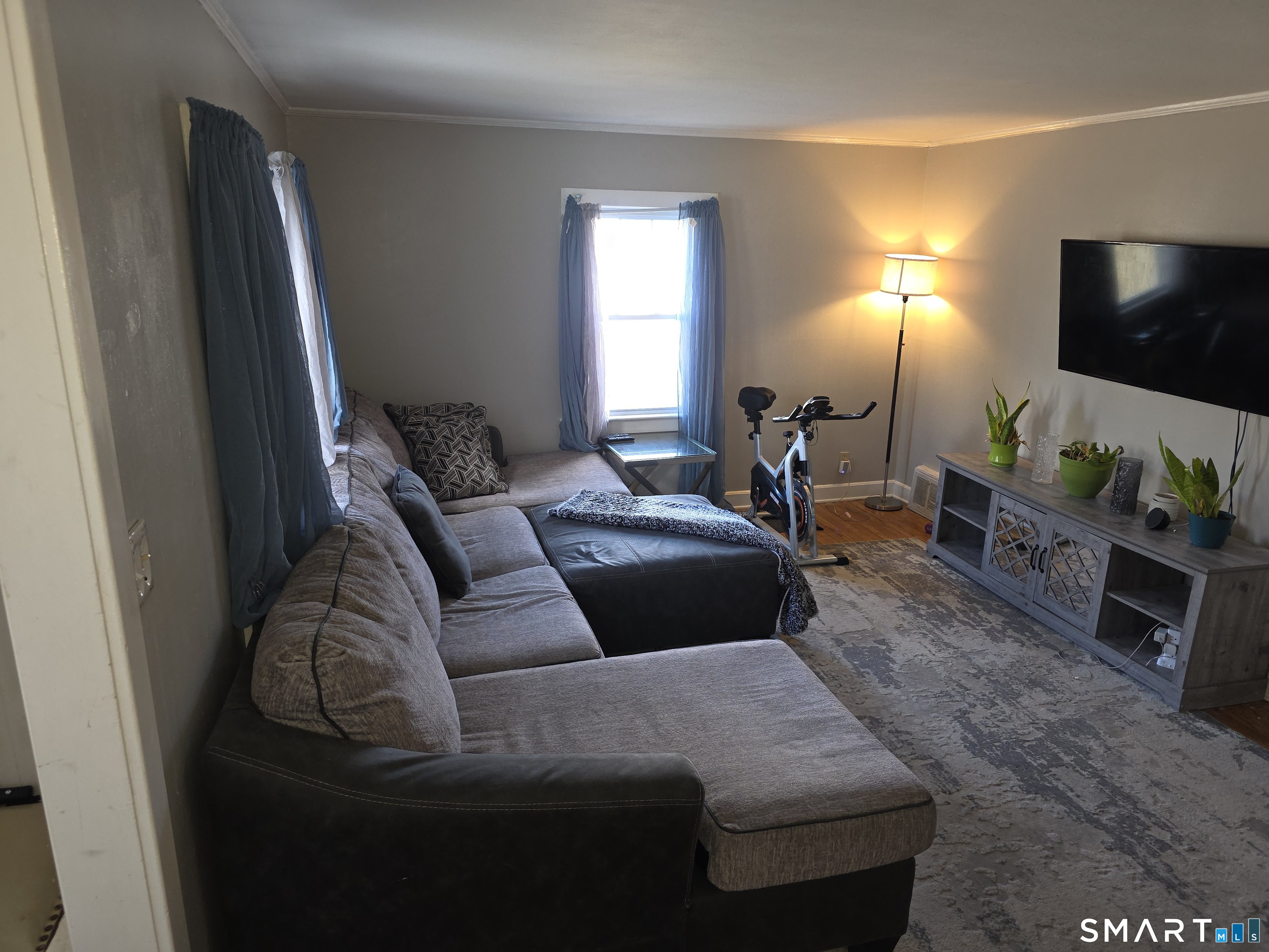 29 Esther Avenue Waterbury, CT 06708 - Photo 5 of 25 a living room with furniture and a flat screen tv