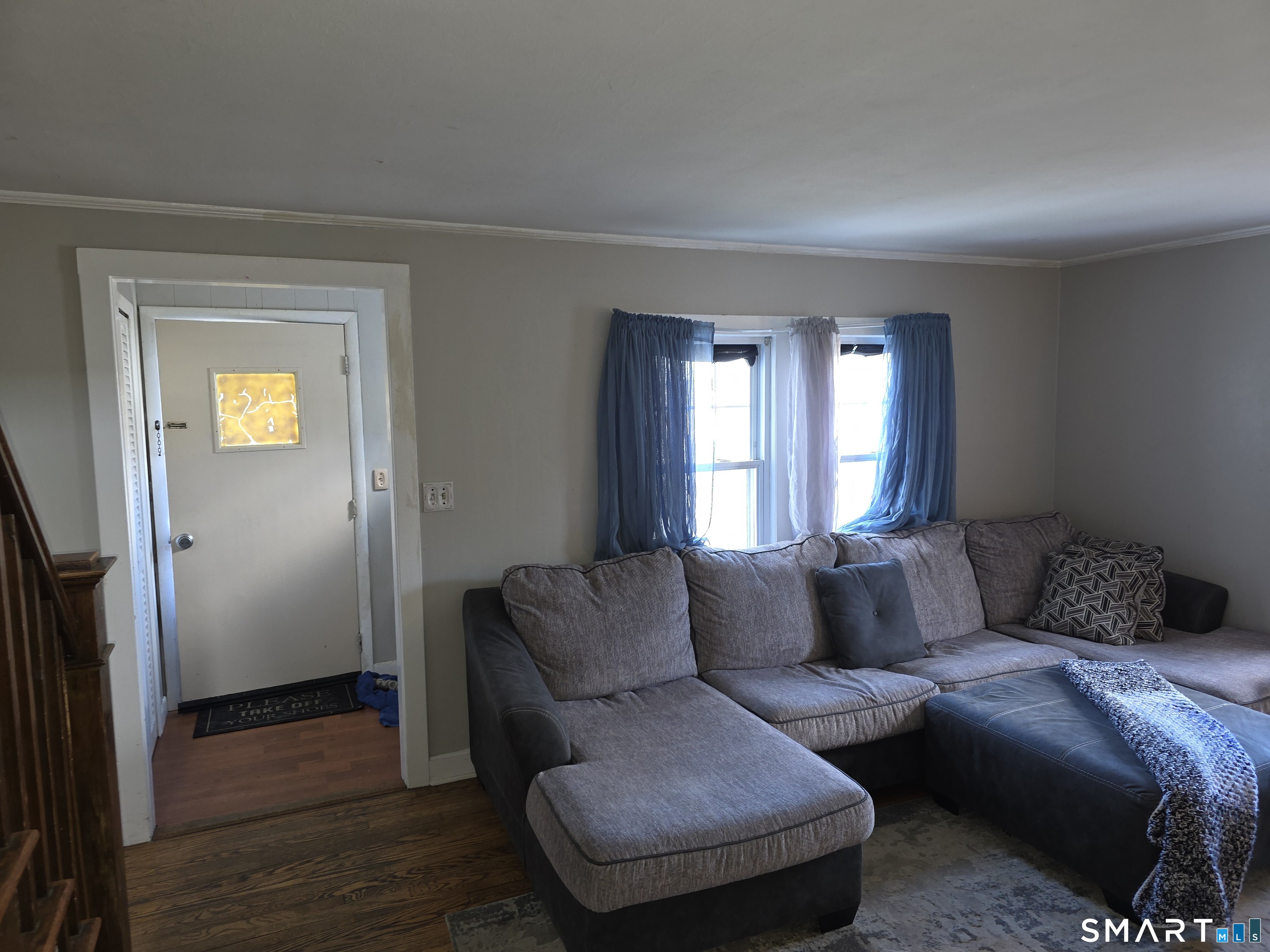 29 Esther Avenue Waterbury, CT 06708 - Photo 6 of 25 a living room with a couch and a window