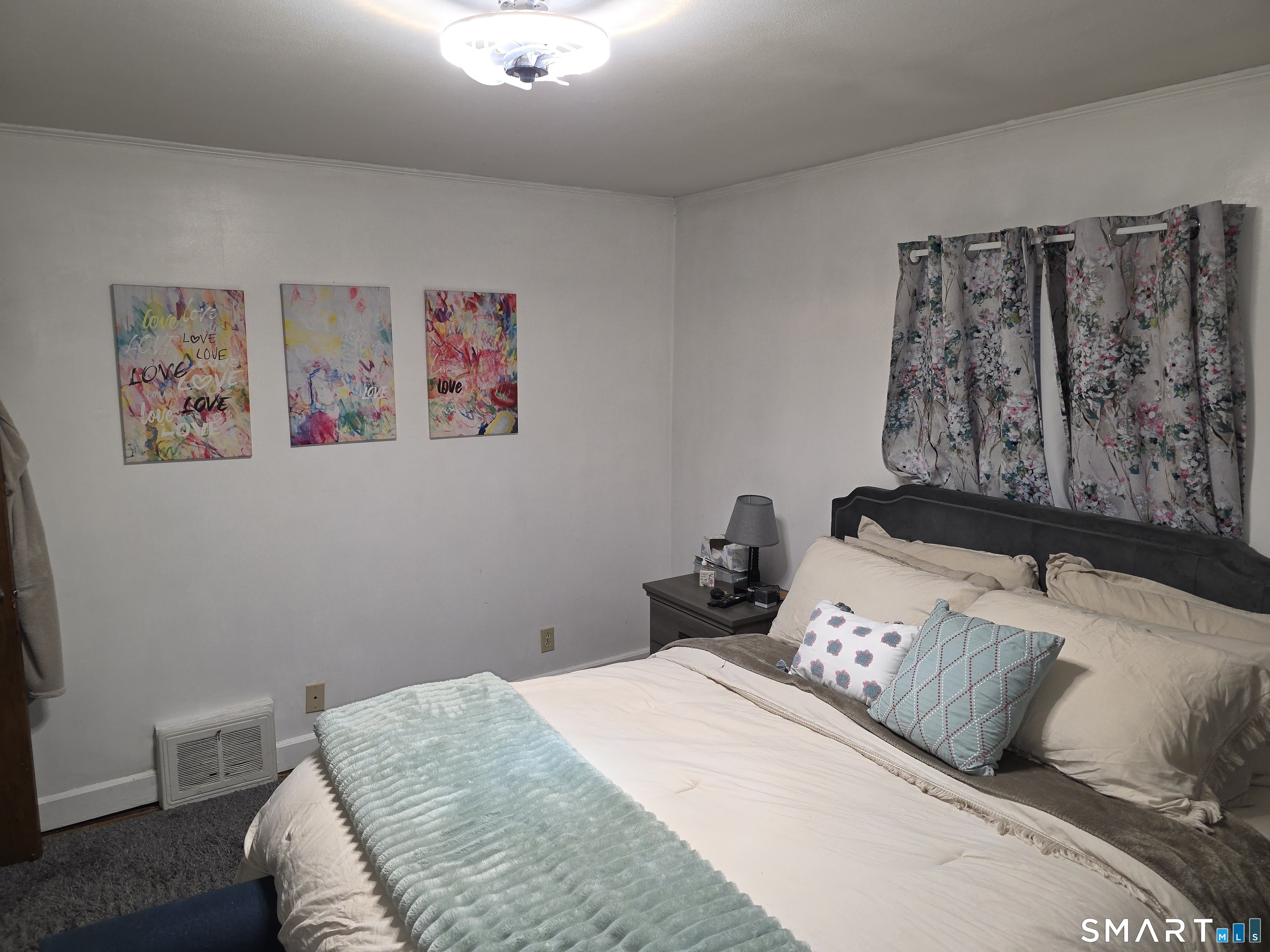 29 Esther Avenue Waterbury, CT 06708 - Photo 10 of 25 a bedroom with a bed and a couch