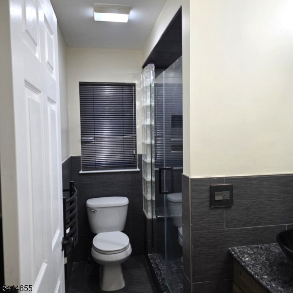 24 Van Vechten Street, Unit 3 Newark, NJ 07114 - Photo 13 of 36 a bathroom with a toilet