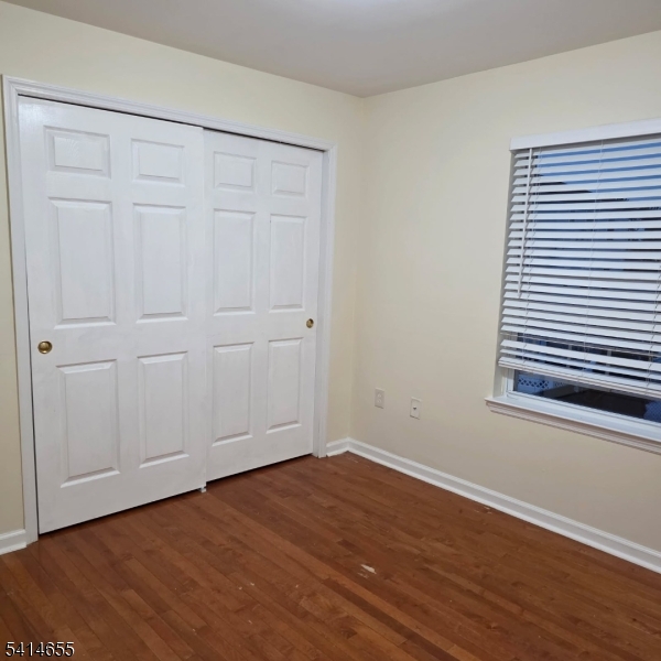 24 Van Vechten Street, Unit 3 Newark, NJ 07114 - Photo 26 of 36 a view of a room with wooden floor and a window