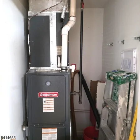 a view of a hall with an entryway