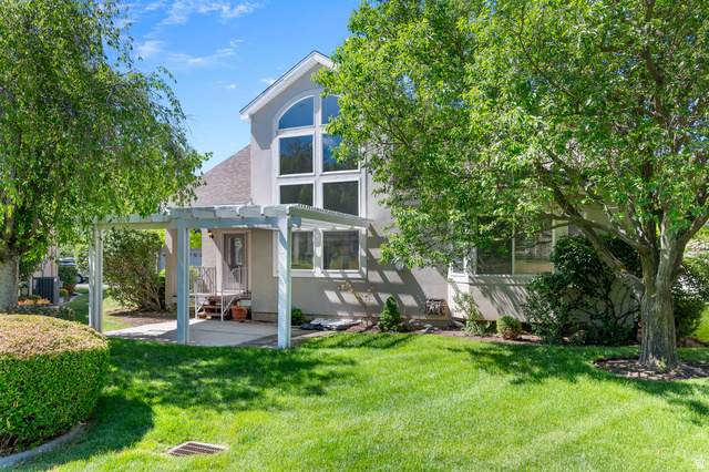 1417 Blacksmith Lane Draper, UT 84020 - Photo 44 of 57 Expansive green lawn with mature trees providing natural shading