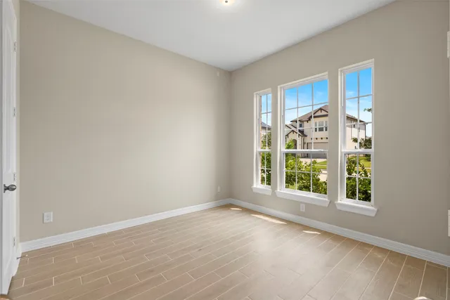 an empty room with windows