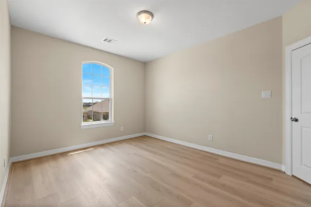 an empty room with a window