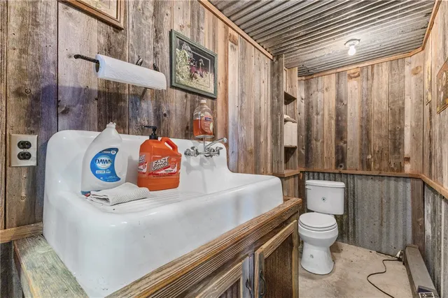 an aerial view of a house with yard