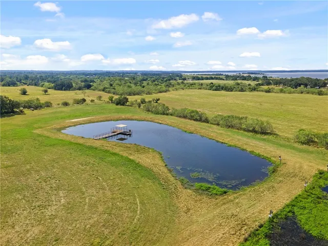 a view of a wooden floor and a small pool