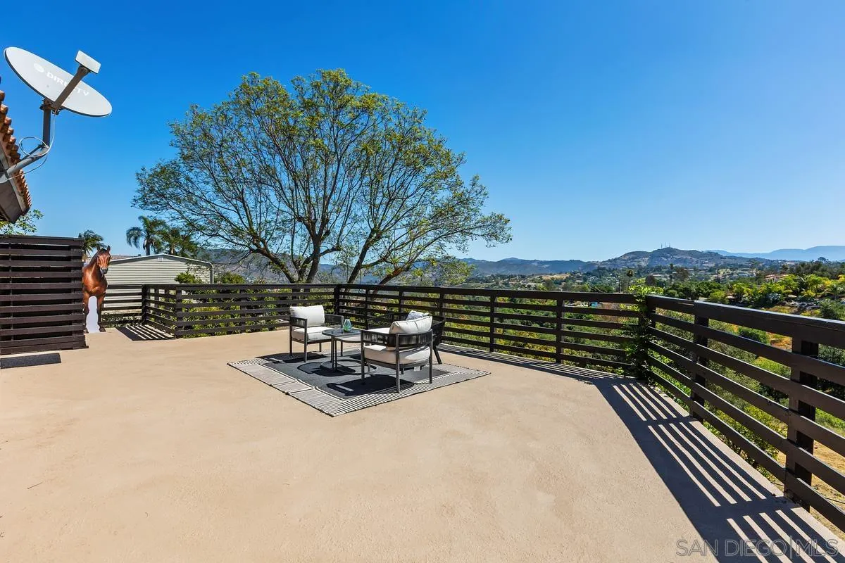 974 Via Hillview Fallbrook, CA 92028 - Photo 13 of 43 a view of a terrace with a bench