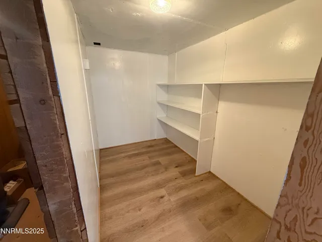 a kitchen that has a sink and a stove