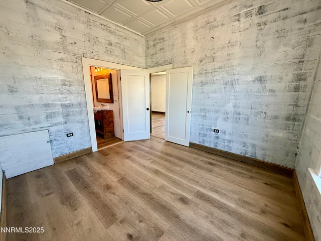 a bathroom with a sink toilet and a mirror