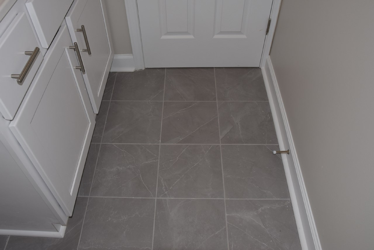 8411 Reedy Ridge Lane Raleigh, NC 27613 - Photo 24 of 30 Porcelain Tile Flooring
