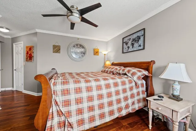 a bedroom with bed and a lamp