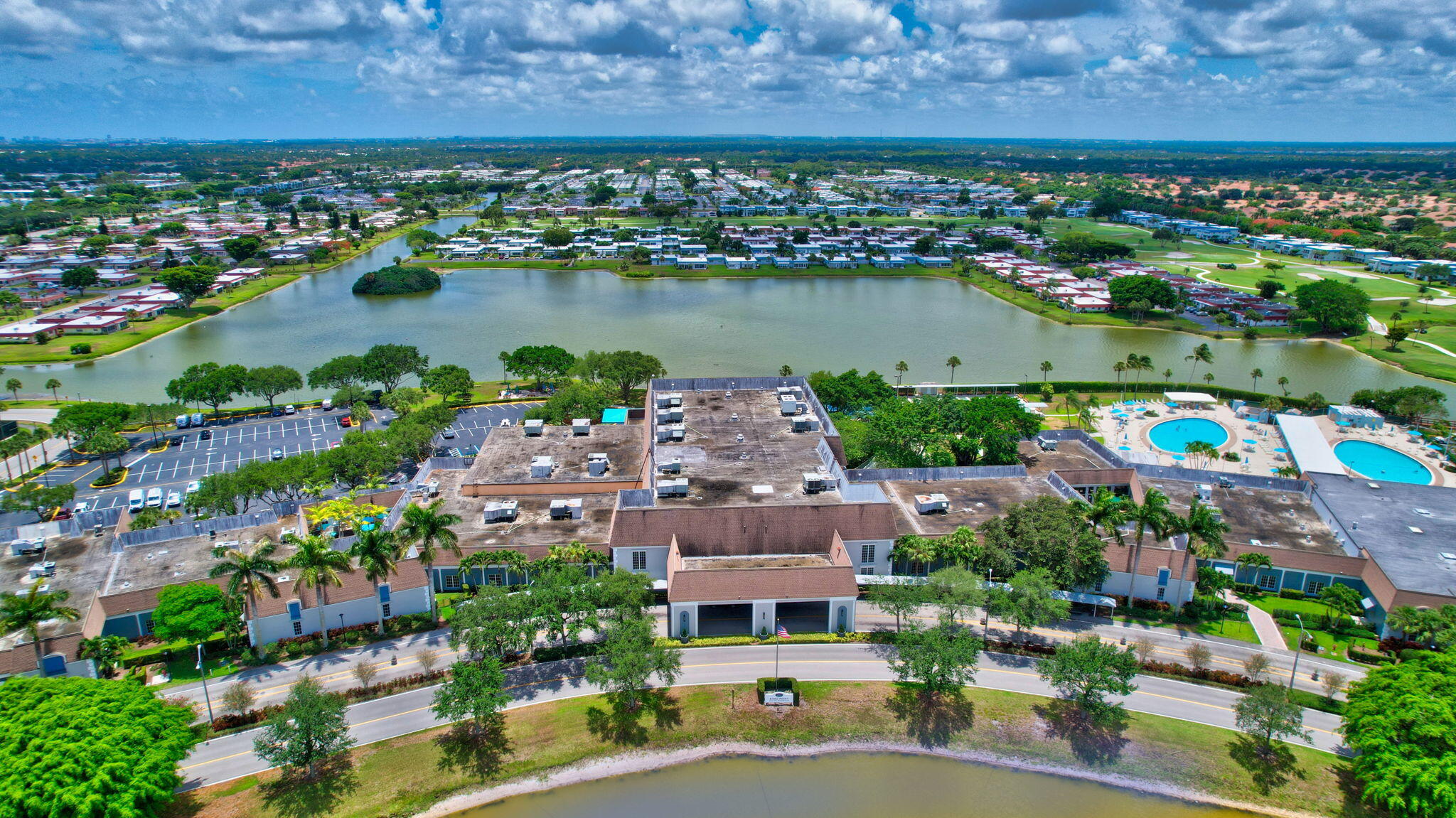 171 Monaco Way Delray Beach, FL 33446 - Photo 51 of 58 an aerial view of a city with lots of residential buildings lake and ocean view