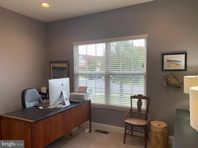 a room with furniture and a window