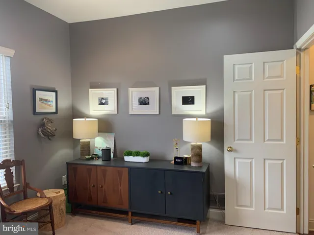 a room with furniture and a window