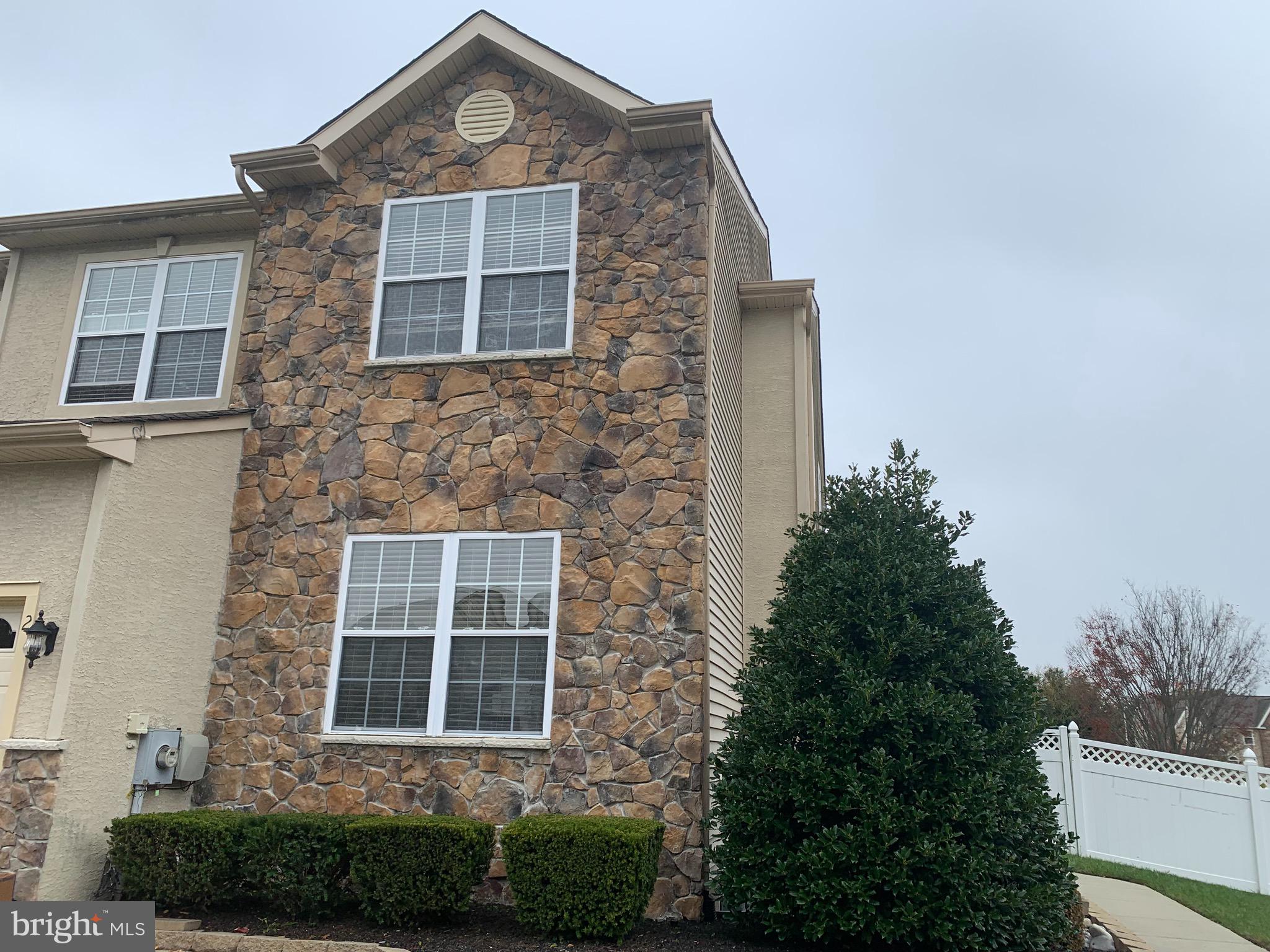 2 Zion Drive Berlin, NJ 08009 - Photo 2 of 37 a front view of a house with a yard