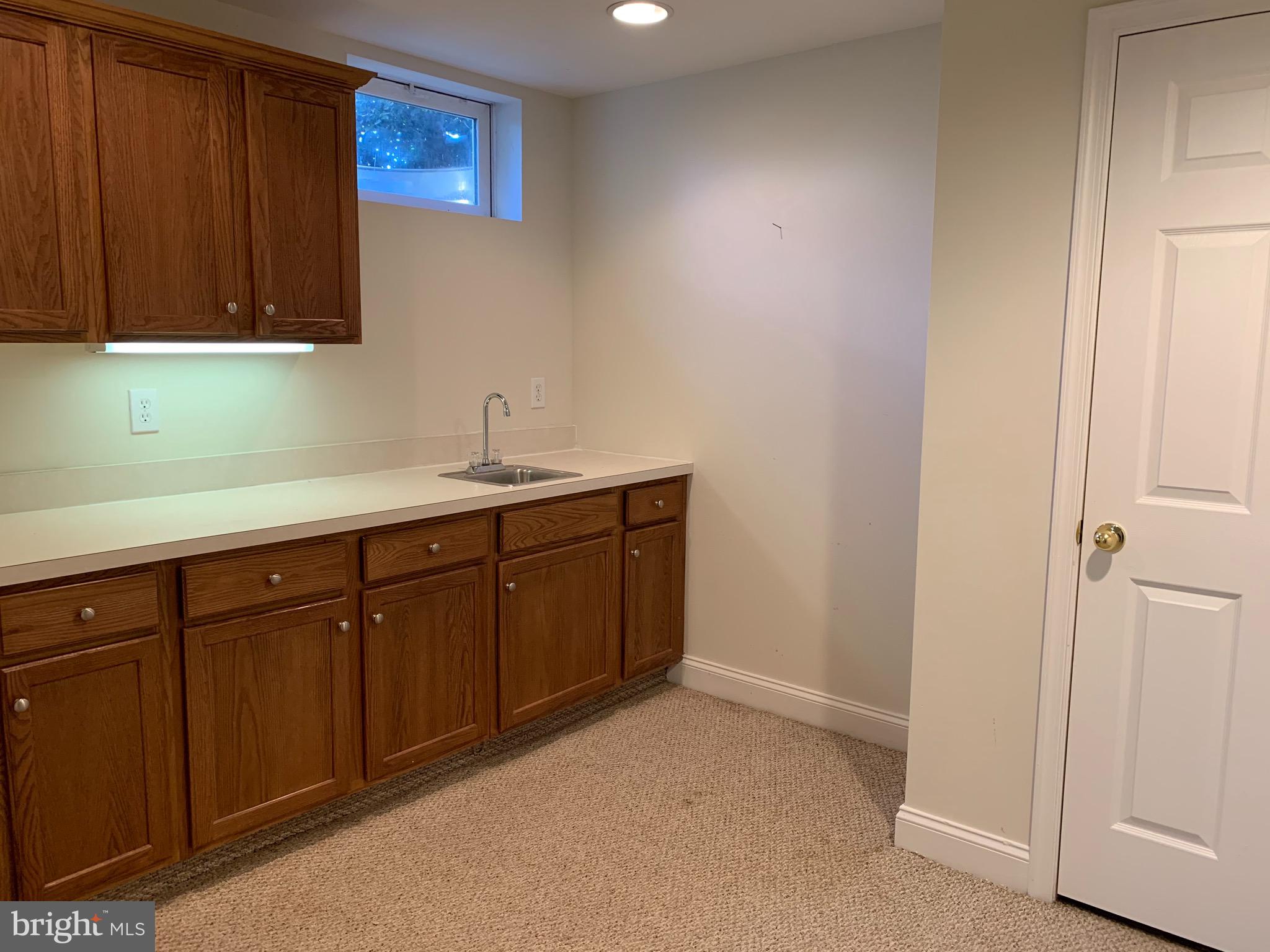 2 Zion Drive Berlin, NJ 08009 - Photo 28 of 37 a kitchen with a sink cabinets and a window