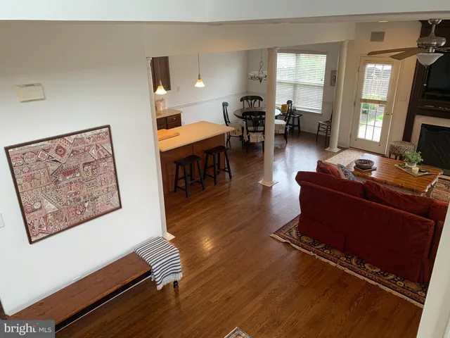 a room with furniture and wooden floor