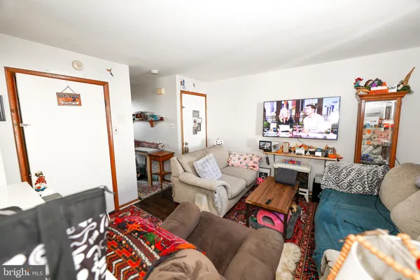 a living room with furniture and a couch