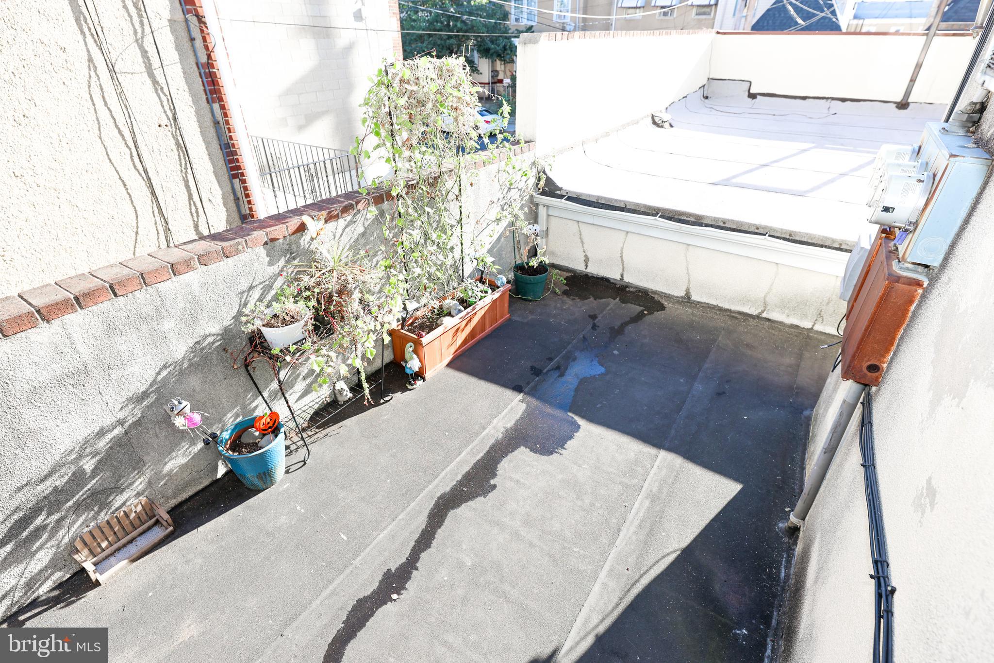 232 Long Lane Upper Darby, PA 19082 - Photo 16 of 29 a living room with furniture and a table