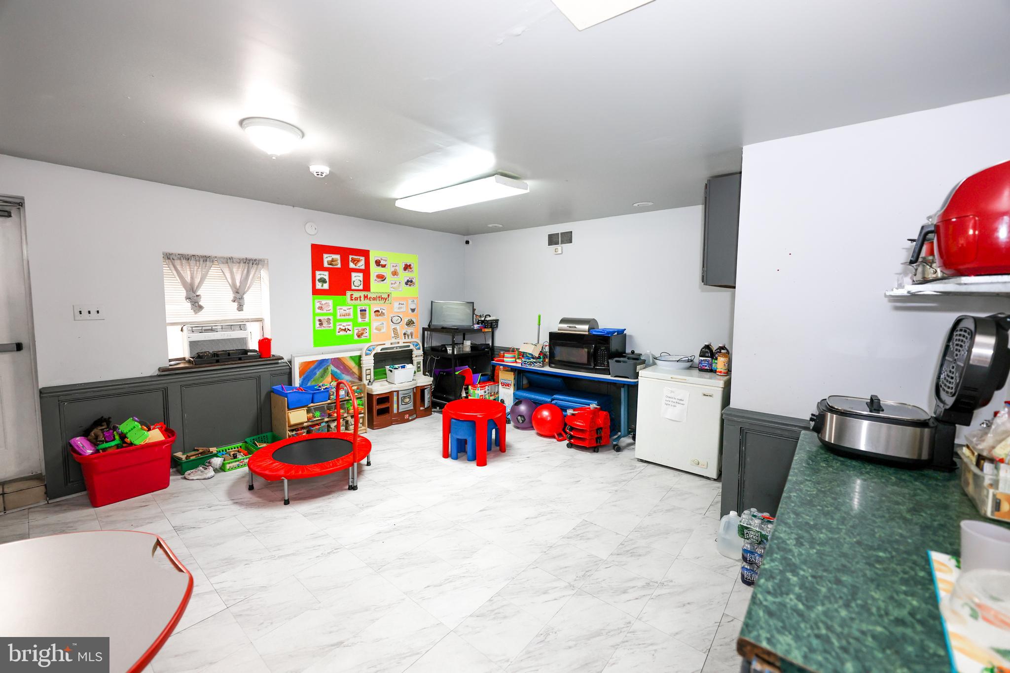 232 Long Lane Upper Darby, PA 19082 - Photo 3 of 29 a play room with toys