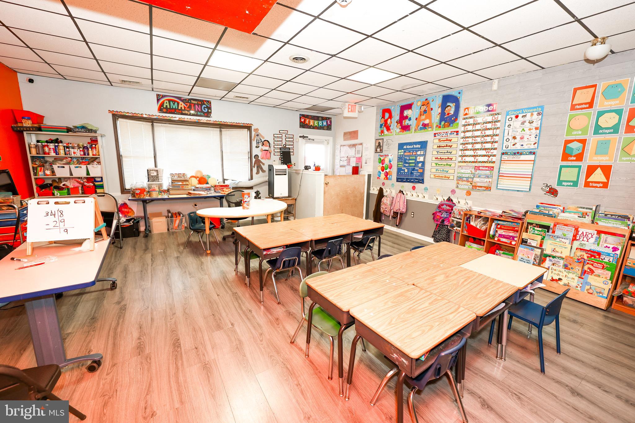 232 Long Lane Upper Darby, PA 19082 - Photo 4 of 29 a outdoor dining area with furniture and wooden floor