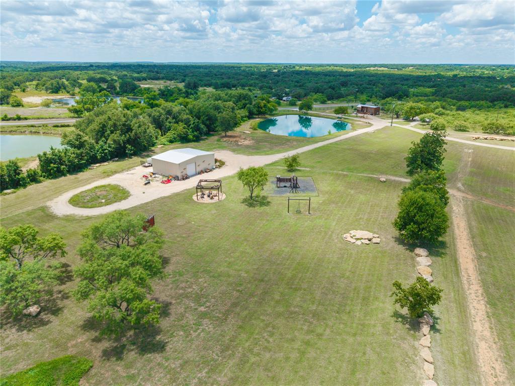 1010 Fm 583 Street West Rising Star, TX 76471 - Photo 7 of 40 a view of a lake with a city