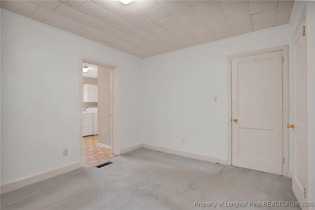 400 Roxie Avenue Fayetteville, NC 28304 - Photo 18 of 33 an empty room with windows