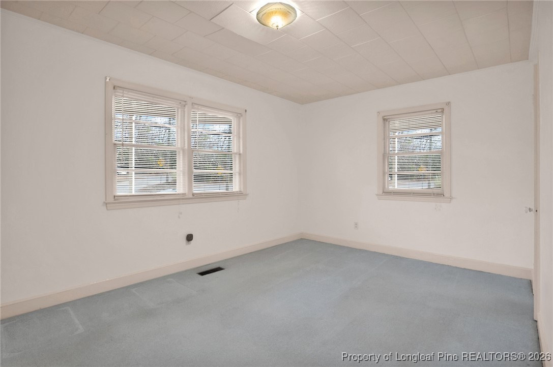 400 Roxie Avenue Fayetteville, NC 28304 - Photo 21 of 33 a view of an empty room with a window