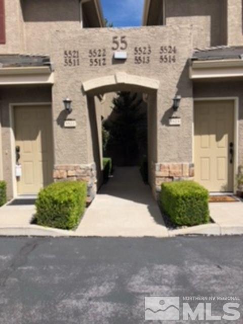 900 S Meadows, Unit 5513 Reno, NV 89521 - Photo 1 of 16 a front view of a house with garden