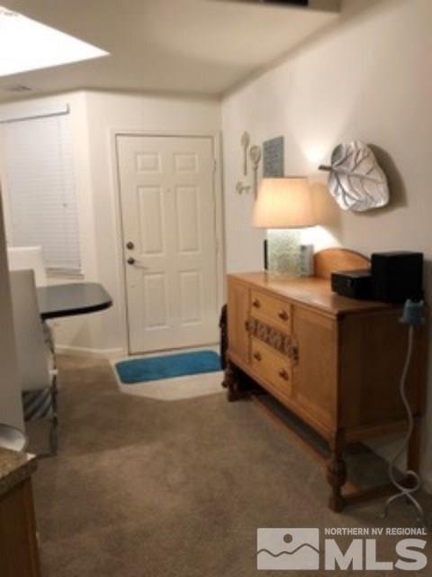 900 S Meadows, Unit 5513 Reno, NV 89521 - Photo 4 of 16 a bedroom with a bed and cabinets