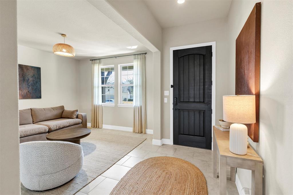 5241 Ranchero Trail Fort Worth, TX 76126 - Photo 4 of 29 a living room with furniture and a window
